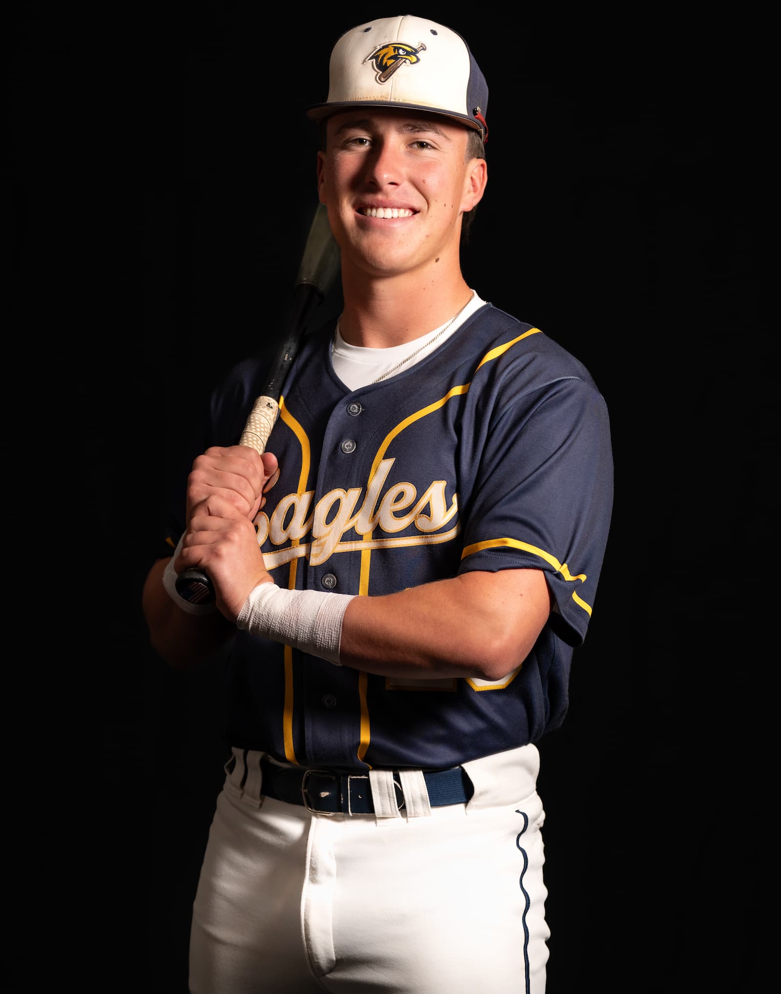 Eagles baseball athlete portrait with bat