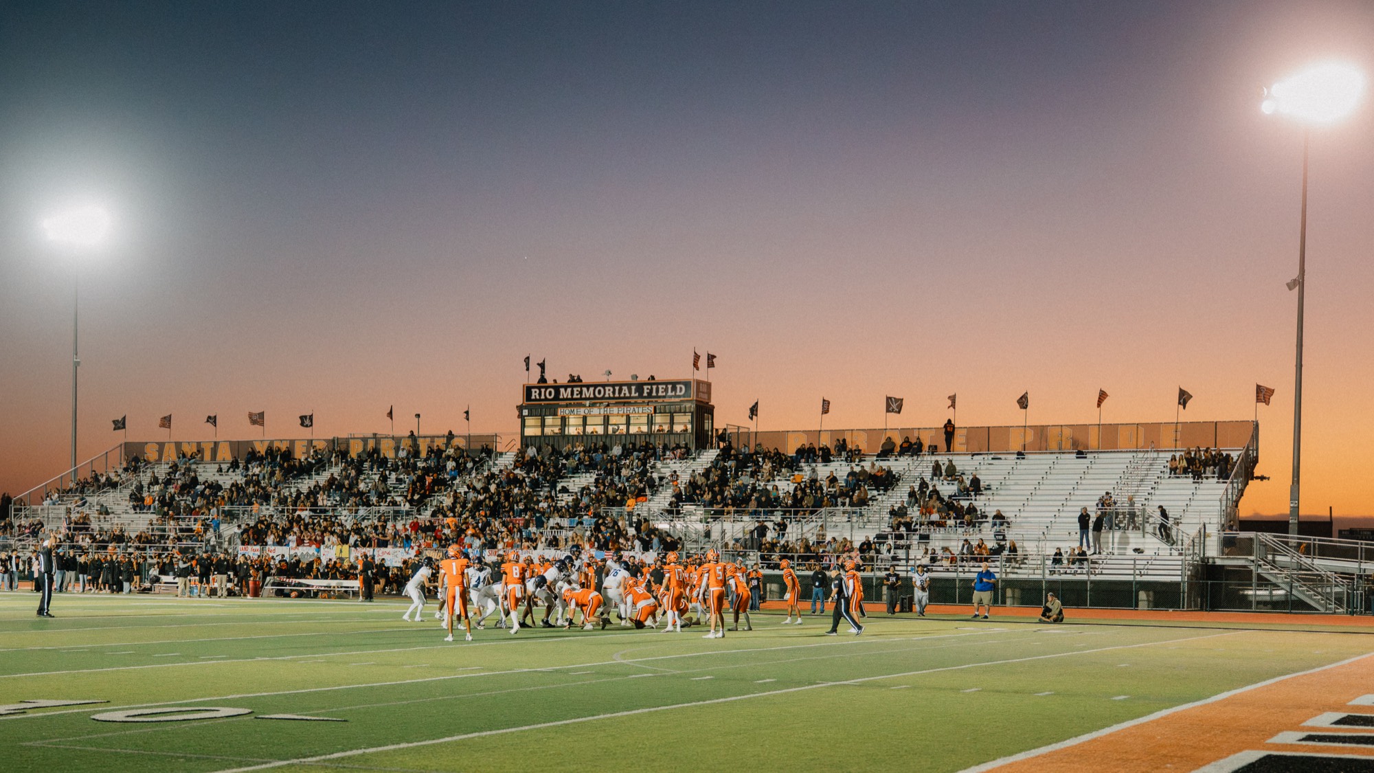 Sunset over Rio Memorial Field, Santa Ynez, before an Arroyo Grande football game on the road